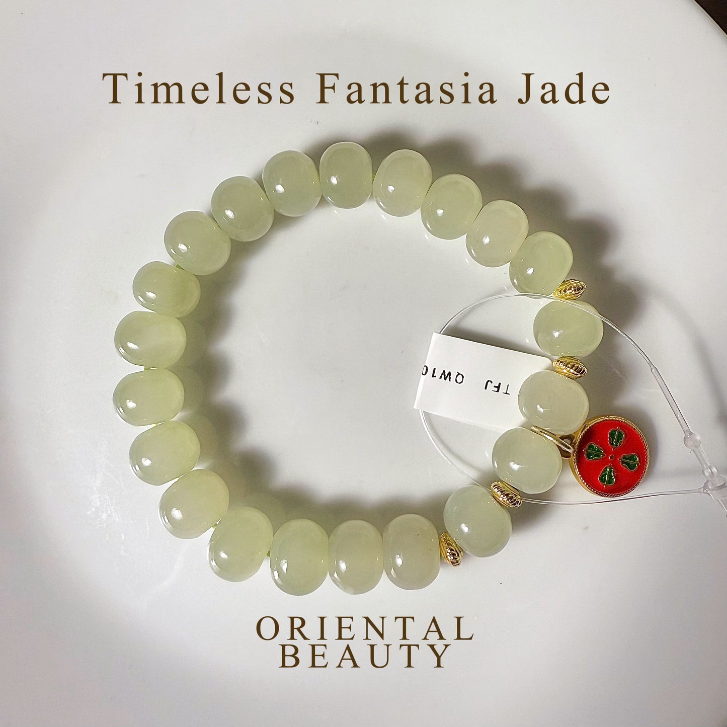 Certified genuine light water green Hetian Jade Bracelet - 10mm oval beads - 6.5 inch